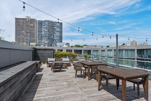 9 Avenue At Port Imperial Unit 313, West New York, NJ 07093 - wooden terrace featuring outdoor lounge area and outdoor dining space