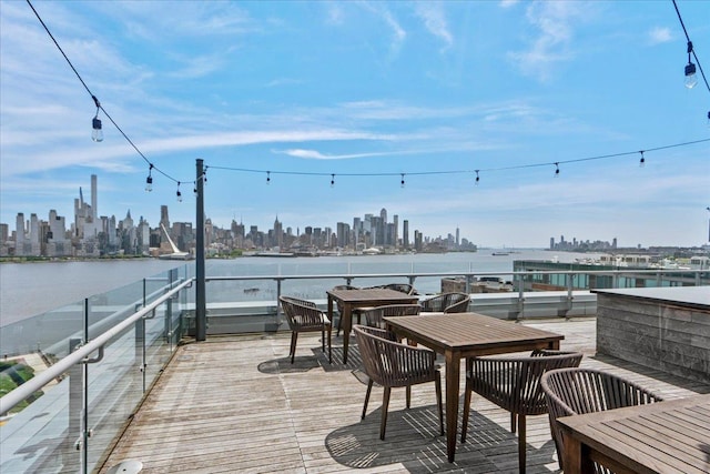 9 Avenue At Port Imperial Unit 313, West New York, NJ 07093 - wooden terrace featuring a skyline view and a water view