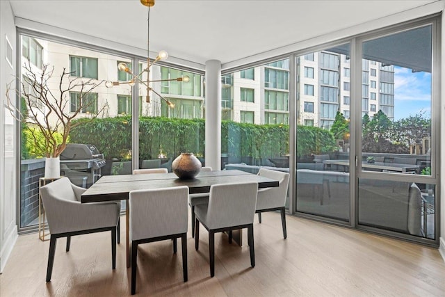 9 Avenue At Port Imperial Unit 313, West New York, NJ 07093 - sunroom with a chandelier