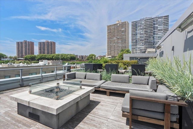 9 Avenue At Port Imperial Unit 313, West New York, NJ 07093 - deck with an outdoor living space with a fire pit and a city view