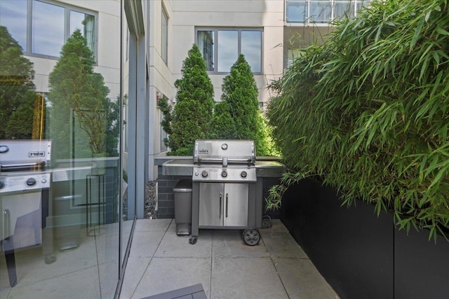 9 Avenue At Port Imperial Unit 313, West New York, NJ 07093 - view of patio featuring a grill