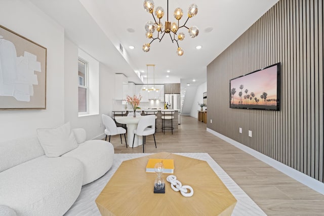 248 New York Ave Unit 1, Jersey City, NJ 07307 - living room with a chandelier, baseboards, light wood-style flooring, and recessed lighting