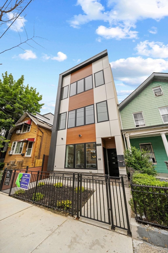 248 New York Ave Unit 1, Jersey City, NJ 07307 - view of building exterior with a fenced front yard