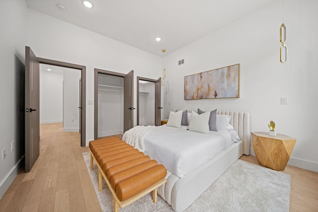 248 New York Ave Unit 1, Jersey City, NJ 07307 - bedroom with light wood-type flooring, recessed lighting, and baseboards