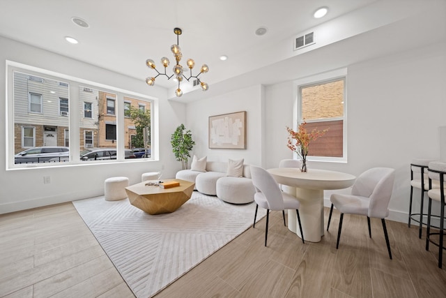 248 New York Ave Unit 1, Jersey City, NJ 07307 - living room with a chandelier, baseboards, wood finished floors, and recessed lighting