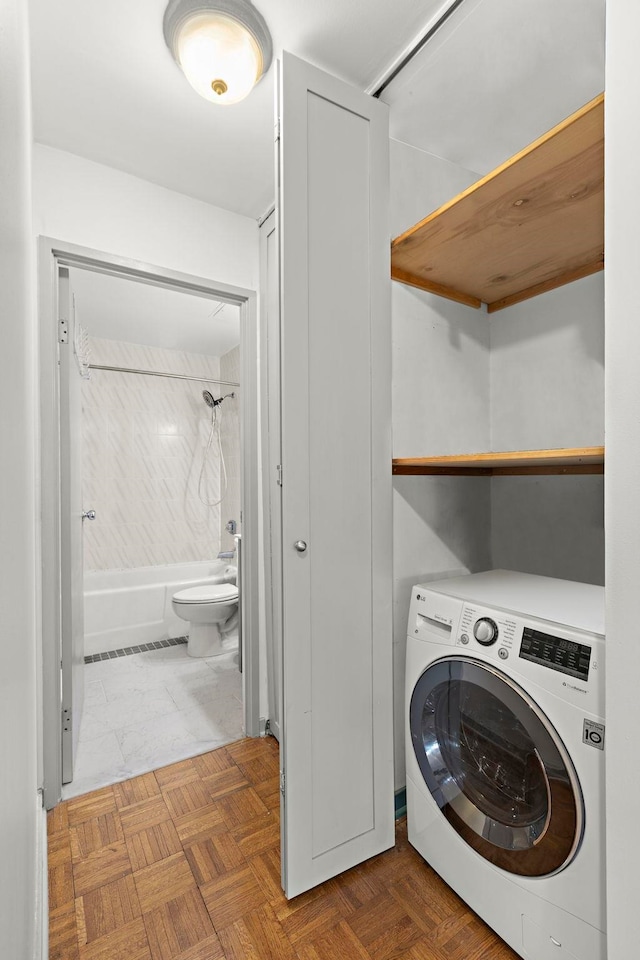 1 Greene St Unit 710, Jersey City, NJ 07302 - washroom featuring washer / dryer