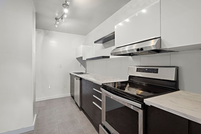 1 Greene St Unit 710, Jersey City, NJ 07302 - kitchen featuring stainless steel appliances, ventilation hood, open shelves, modern cabinets, and light tile patterned floors