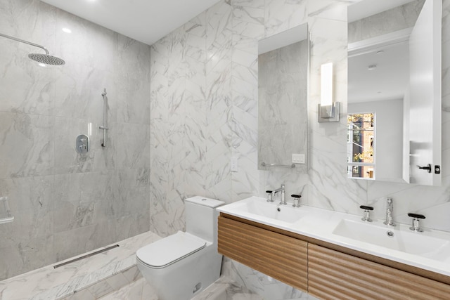 bathroom with double vanity, toilet, a sink, walk in shower, and tile walls