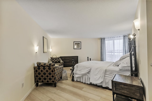 bedroom featuring light hardwood / wood-style flooring