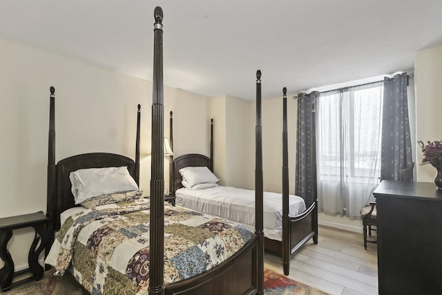 bedroom featuring light hardwood / wood-style floors