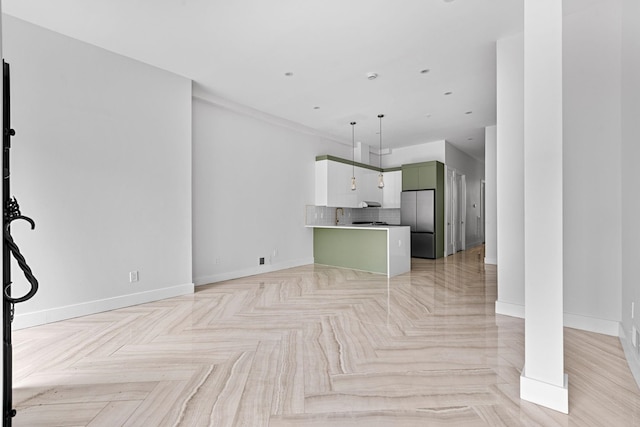 322 3rd St Unit 1, Jersey City, NJ 07302 - unfurnished living room with baseboards