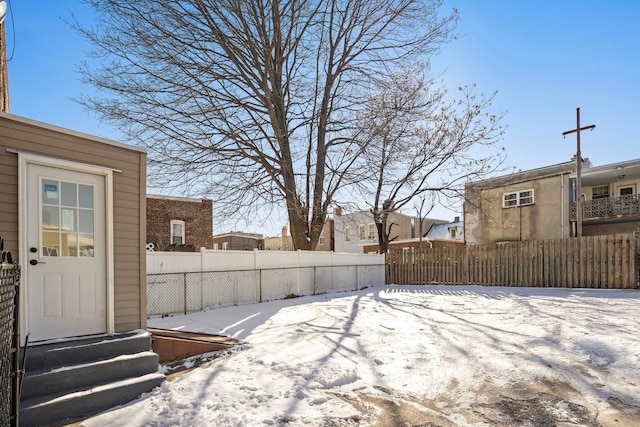 view of yard covered in snow