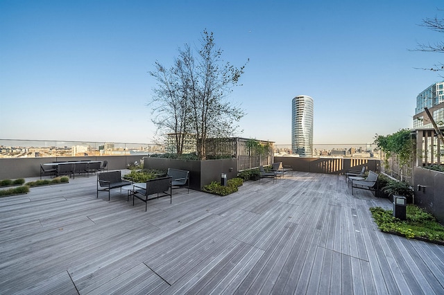 deck featuring outdoor lounge area