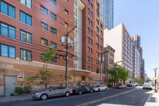 view of building exterior featuring a city view