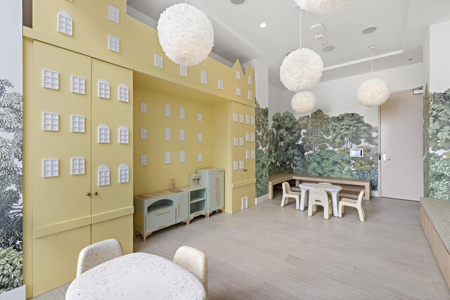 43 Provost St Unit 10O, Jersey City, NJ 07302 - dining space with a towering ceiling and wood finished floors