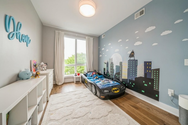502 Palisade Ave Unit 301, Jersey City, NJ 07307 - bedroom with wood finished floors and baseboards