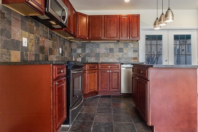 33 W 24th St, Bayonne, NJ 07002 - kitchen featuring appliances with stainless steel finishes, dark brown cabinets, decorative backsplash, and dark countertops
