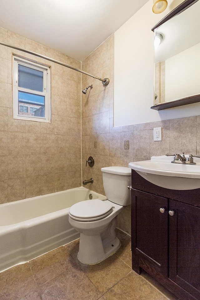 33 W 24th St, Bayonne, NJ 07002 - full bathroom with toilet, vanity, shower / bath combination, tile patterned flooring, and tile walls