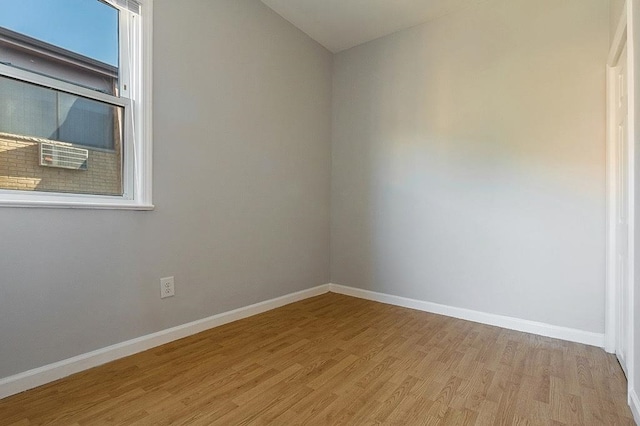 33 W 24th St, Bayonne, NJ 07002 - spare room with light wood-type flooring and baseboards