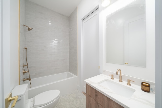 bathroom with toilet, vanity, and tub / shower combination