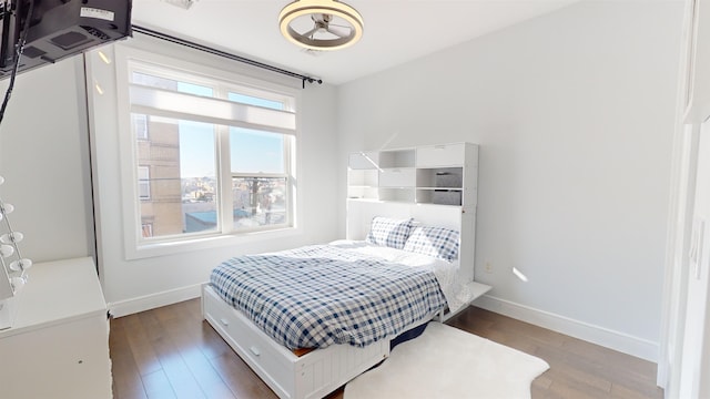 bedroom featuring hardwood / wood-style floors