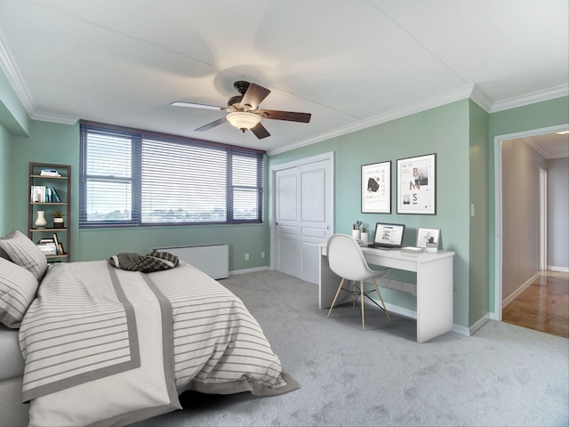 250 Gorge Rd Unit 16D, Cliffside Park, NJ 07010 - bedroom with ornamental molding, light colored carpet, an office area, a closet, and ceiling fan