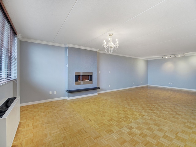 250 Gorge Rd Unit 16D, Cliffside Park, NJ 07010 - unfurnished living room featuring a chandelier, a fireplace, and ornamental molding