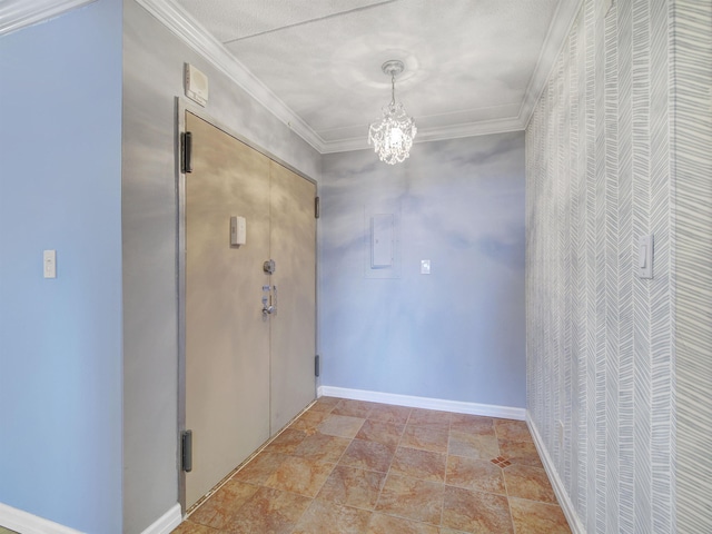 250 Gorge Rd Unit 16D, Cliffside Park, NJ 07010 - hall featuring crown molding, a chandelier, and stone finish floors