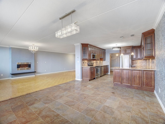250 Gorge Rd Unit 16D, Cliffside Park, NJ 07010 - kitchen with appliances with stainless steel finishes, a chandelier, light countertops, open floor plan, and crown molding