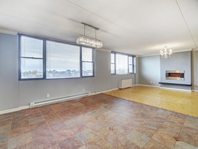 250 Gorge Rd Unit 16D, Cliffside Park, NJ 07010 - spare room with a baseboard heating unit, ornamental molding, a chandelier, stone finish floors, and radiator heating unit