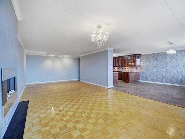250 Gorge Rd Unit 16D, Cliffside Park, NJ 07010 - unfurnished living room featuring ornamental molding, a chandelier, and wallpapered walls