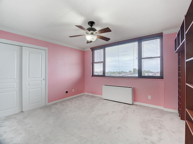 250 Gorge Rd Unit 16D, Cliffside Park, NJ 07010 - unfurnished bedroom featuring crown molding, carpet floors, a closet, and ceiling fan