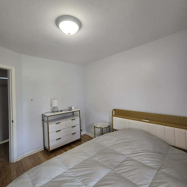 592 Forest St, Kearny, NJ 07032 - bedroom featuring wood finished floors and baseboards