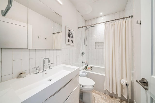 full bathroom with vanity, toilet, tile walls, shower / bathtub combination with curtain, and backsplash