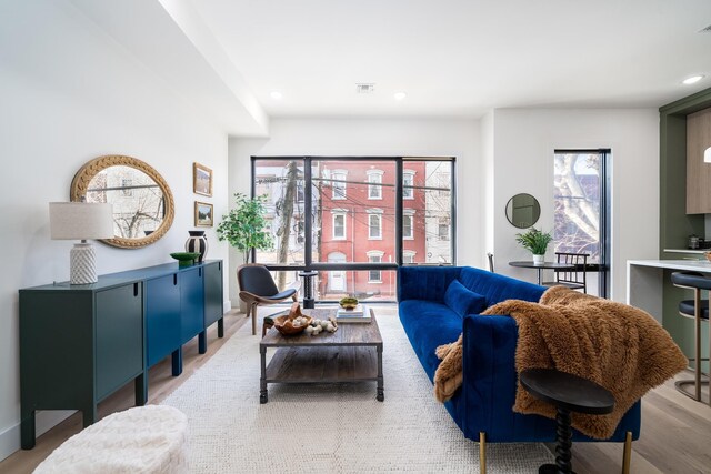 100 Webster Ave Unit 2, Jersey City, NJ 07307 - living area featuring light wood-style floors and recessed lighting