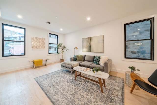 22 Bright St Unit 1, Jersey City, NJ 07302 - living area with light wood finished floors, baseboards, and recessed lighting