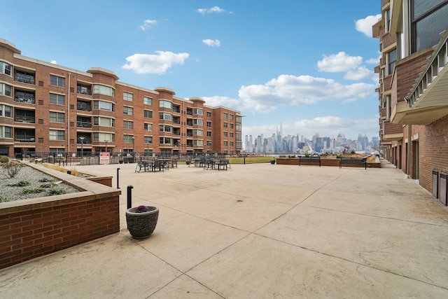20 Avenue At Port Imperial Unit 113, West New York, NJ 07093 - view of patio / terrace featuring a view of skyline