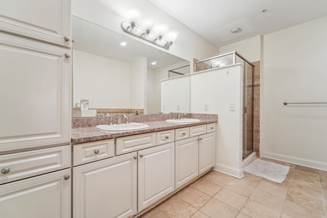 20 Avenue At Port Imperial Unit 113, West New York, NJ 07093 - full bath featuring a stall shower, double vanity, and baseboards