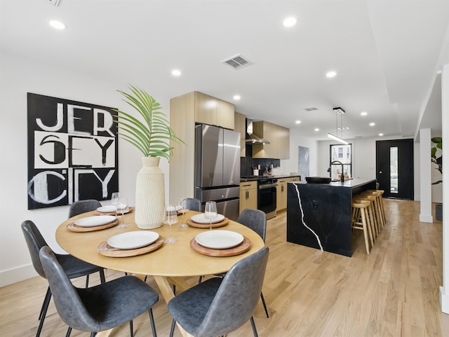 63 Jefferson Ave Unit 1, Jersey City, NJ 07307 - dining space featuring light wood-style floors and recessed lighting