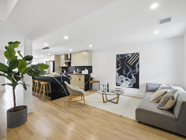 63 Jefferson Ave Unit 1, Jersey City, NJ 07307 - living room featuring light wood finished floors and recessed lighting