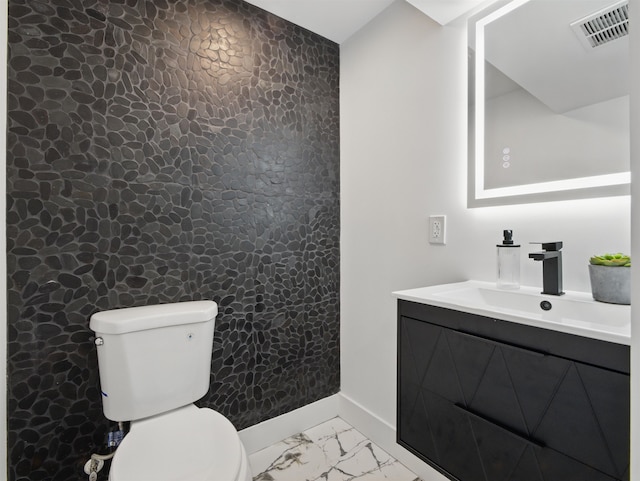 63 Jefferson Ave Unit 1, Jersey City, NJ 07307 - bathroom with marble look tiles and vanity