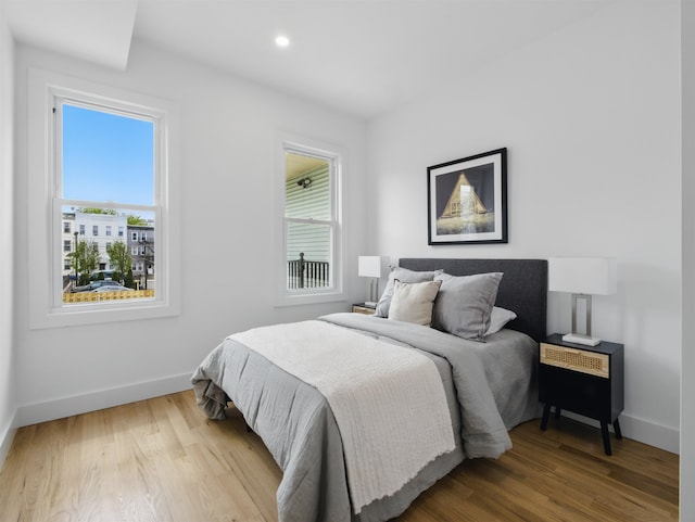 63 Jefferson Ave Unit 1, Jersey City, NJ 07307 - bedroom featuring multiple windows, wood finished floors, and recessed lighting
