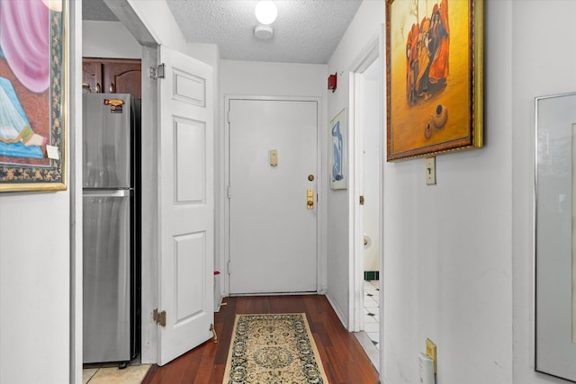 401 Harmon Cv, Secaucus, NJ 07094 - doorway featuring wood finished floors and a textured ceiling