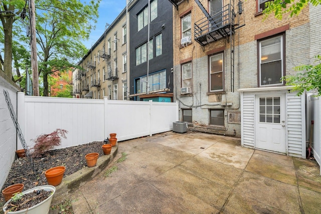 1228 Park Ave Unit B, Hoboken, NJ 07030 - fenced backyard with a patio and cooling unit