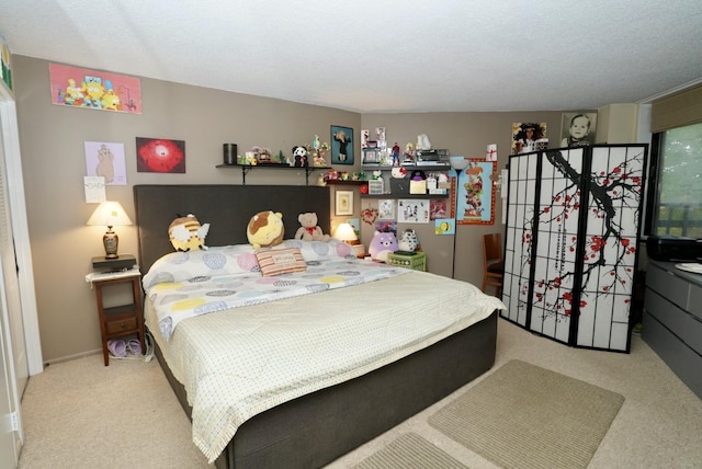 carpeted bedroom with a textured ceiling