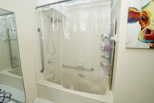 bathroom featuring shower / tub combo with curtain and tile patterned floors