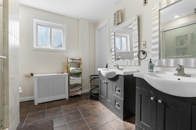 2746 John F Kennedy Blvd, Jersey City, NJ 07306 - full bathroom with an enclosed shower, vanity, radiator, tile patterned flooring, and baseboards