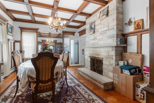 2746 John F Kennedy Blvd, Jersey City, NJ 07306 - dining space with an inviting chandelier, a stone fireplace, coffered ceiling, and beamed ceiling