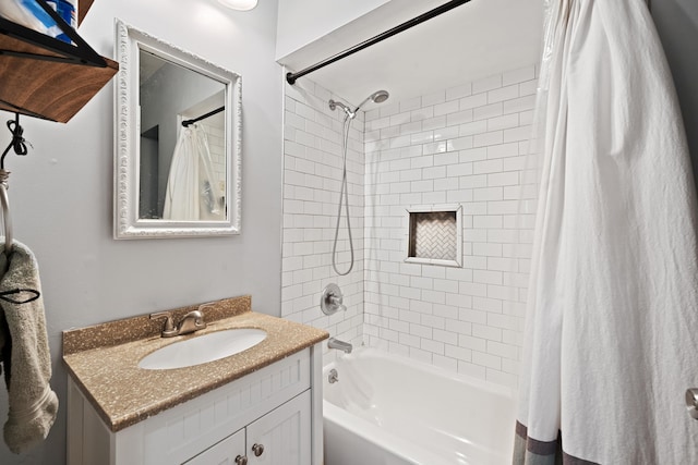 bathroom with vanity and shower / tub combo