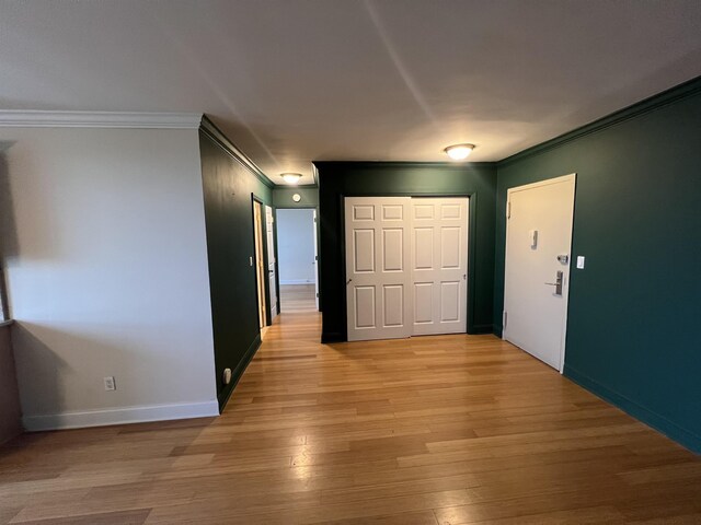 100 Manhattan Ave Unit 1104, Union City, NJ 07087 - spare room with crown molding and light wood-style flooring